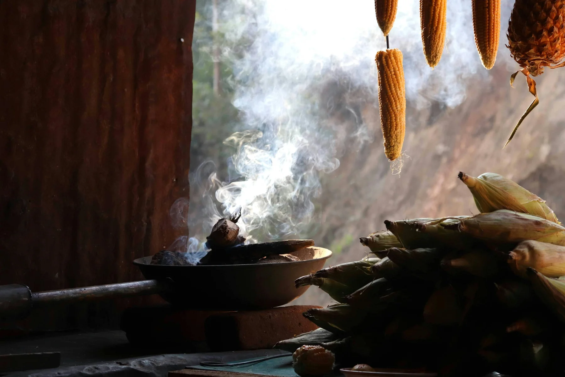 Sunlight and smoke in a traditional Mexican kitchen